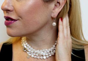 Hazel & Marie: Cultured Pearl earrings on sterling silver on model side 