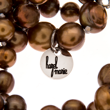 Load image into Gallery viewer, Hazel &amp; Marie: Cultured Pearl necklace, 5 strand twisted in gold color zoom