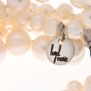 Hazel & Marie: Zoomed in Cultured Pearl necklace tag