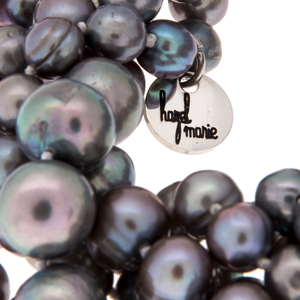 Hazel & Marie: Zoom of Cultured Pearl necklace clasp and tag in slate color