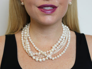 Hazel & Marie: Cultured Pearl large stud earrings in pearl on model
